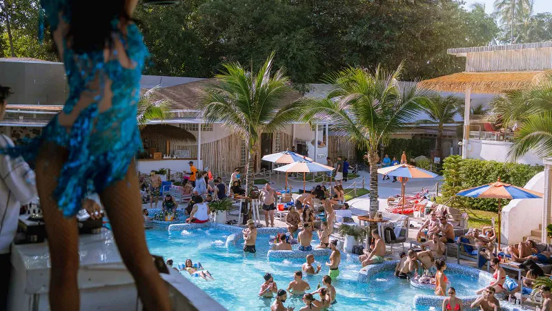 Ark Bar's ARKbar-branded beachfront bar and sun loungers on Chaweng Beach, Koh Samui