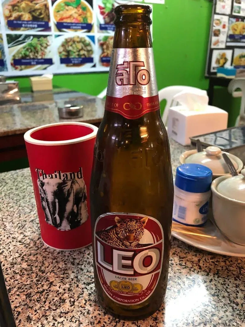 Bottle of Leo beer on a table in a Thai restaurant in Bophut Fisherman's Village