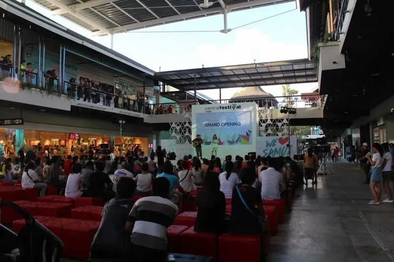 Crowd gathered at an outdoor stage event at Central Samui shopping mall, Koh Samui