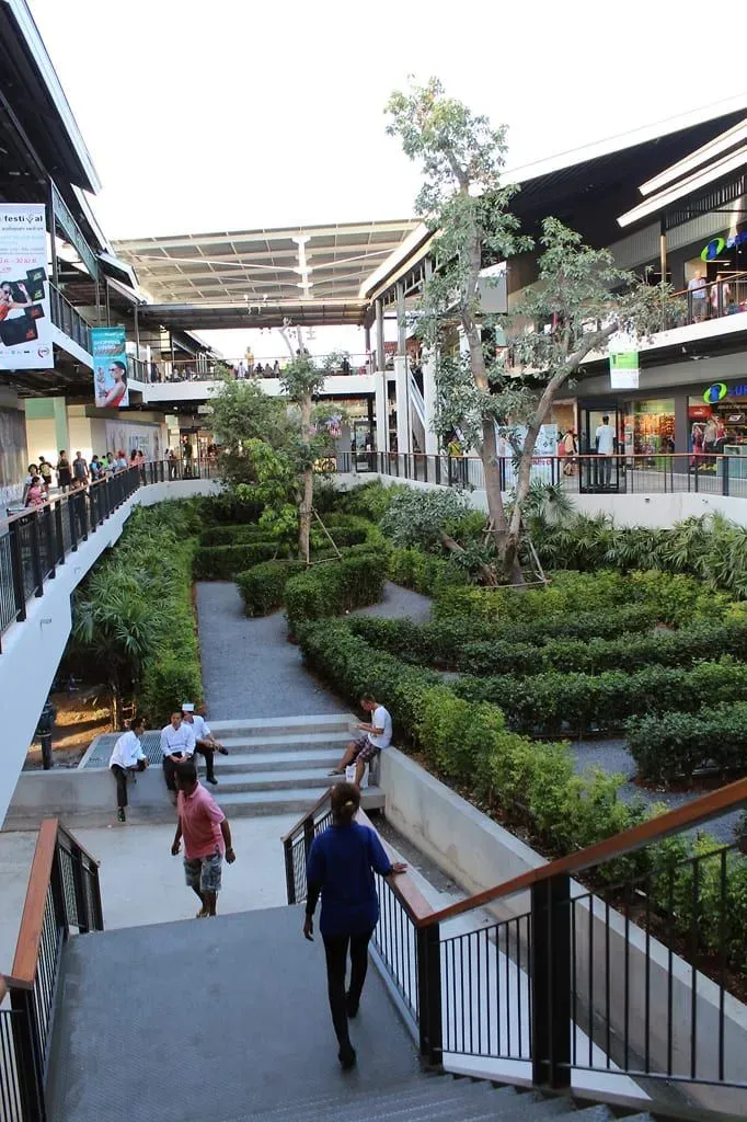 Landscaped garden courtyard with stairs inside Central Samui shopping mall, Koh Samui