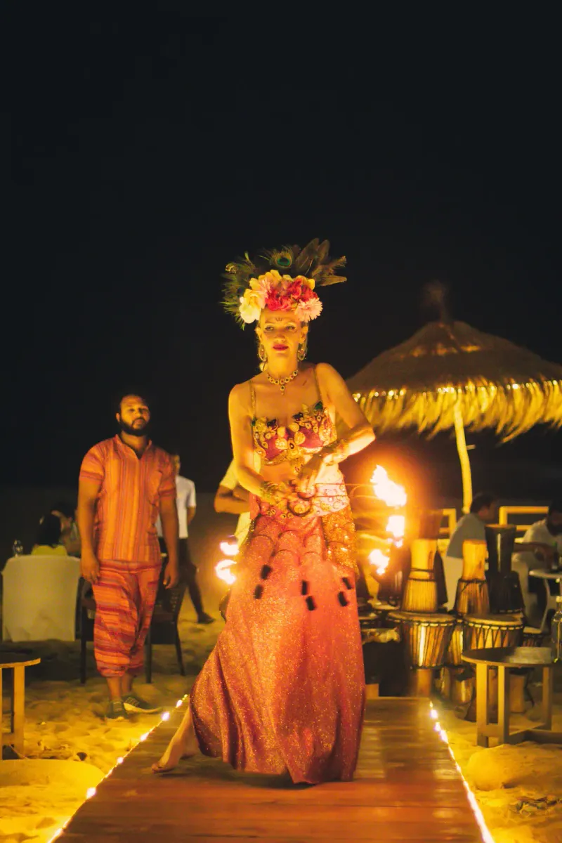 Fire show on a tropical beach at night