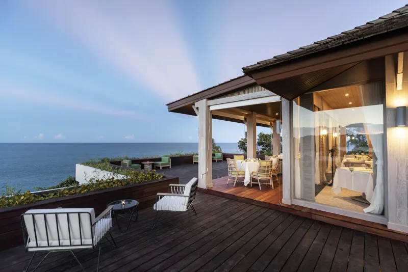 Long Dtai restaurant terrace at Cape Fahn Hotel's private island, Koh Samui, with bay views