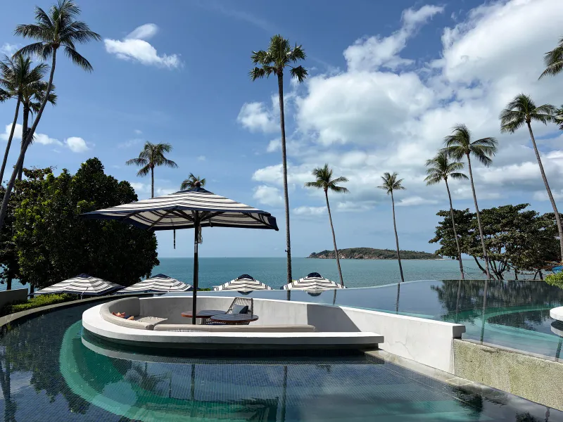 Pool deck at dusk at Hyatt Regency Koh Samui, North Chaweng