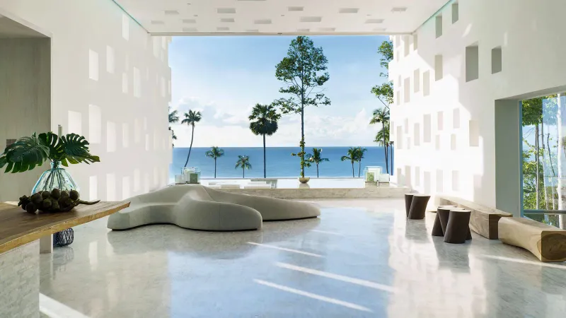 Illuminated kids' feature wall near the pool at Hyatt Regency Koh Samui at night