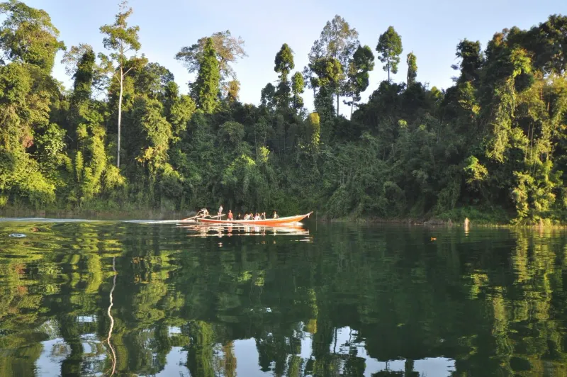 Kayaking on Cheow Lan Lake near a Khao Sok floating raft house camp