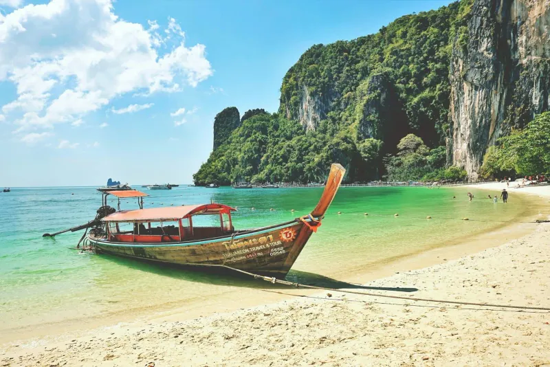 Longtail boat on a beach along Thailand's Andaman coast