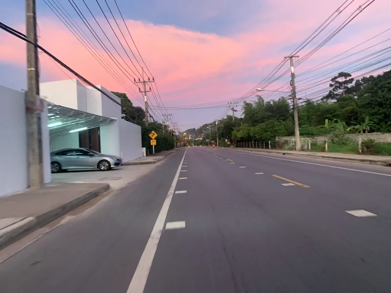 Sunset over the coast road near Maenam and Bang Po on Koh Samui, close to Bang Po Seafood