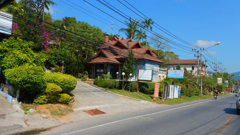 A roadside boutique resort and estate-agency office on the ring road near Lamai and Maret, Koh Samui