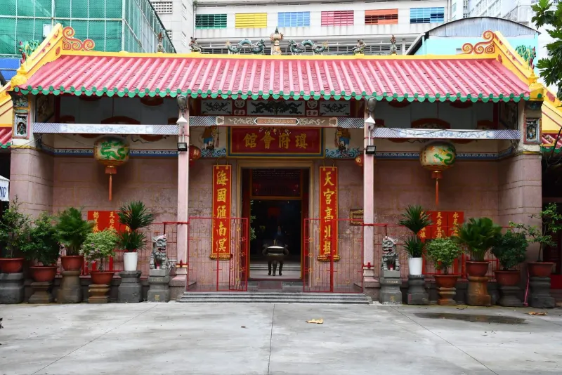 Ornate entrance gate of a traditional Chinese temple in the style found across Thailand