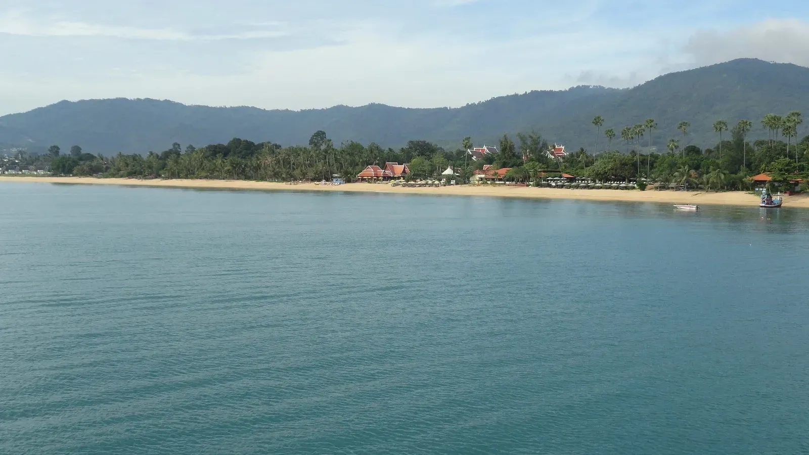 Passengers boarding a Lomprayah high speed catamaran at Maenam Pier Koh Samui bound for Koh Phangan and Koh Tao