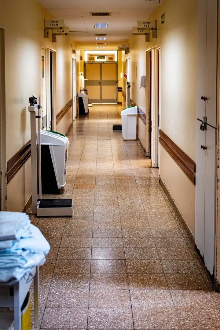 Empty hospital corridor with medical equipment inside a private Koh Samui healthcare facility