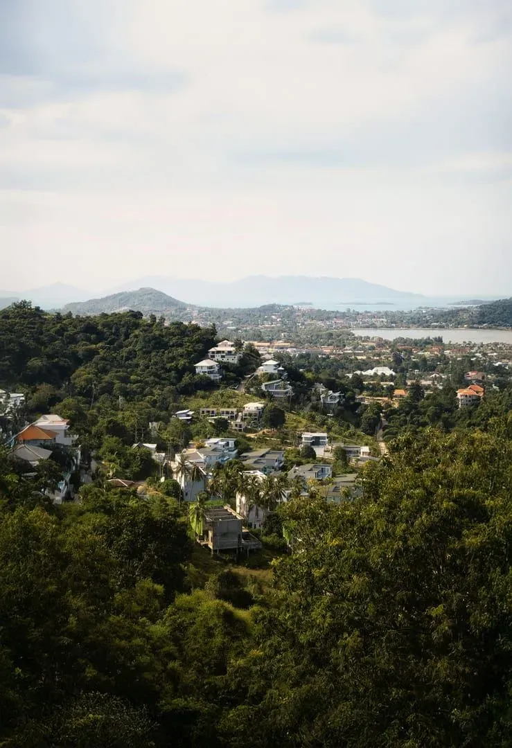 Aerial view of Koh Samui's lush hills and coastline near the island's main hotel strip