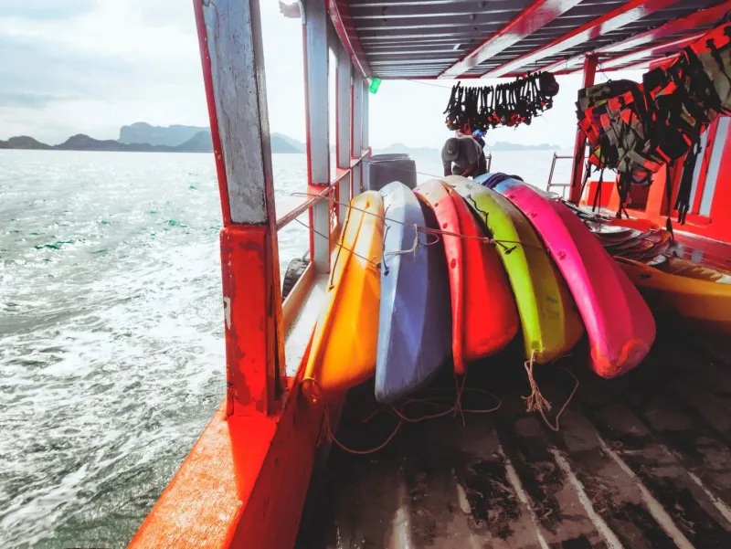 Kayaks secured on a ferry deck used for reaching Koh Samui and nearby islands