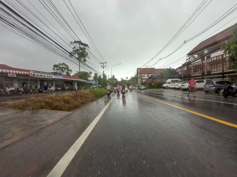 Street-level view of the coast road near Lamai Beach, close to Sabienglae seafood restaurant, Koh Samui
