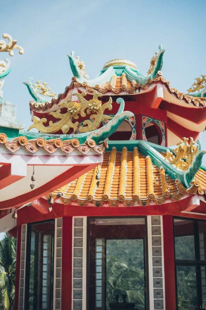 Colorful dragon-carved temple roof detail typical of Koh Samui Buddhist architecture