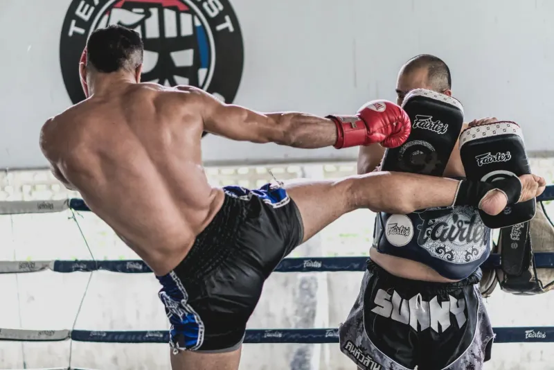 Two fighters sparring in a ring, similar to the undercard bouts at Chaweng stadiums