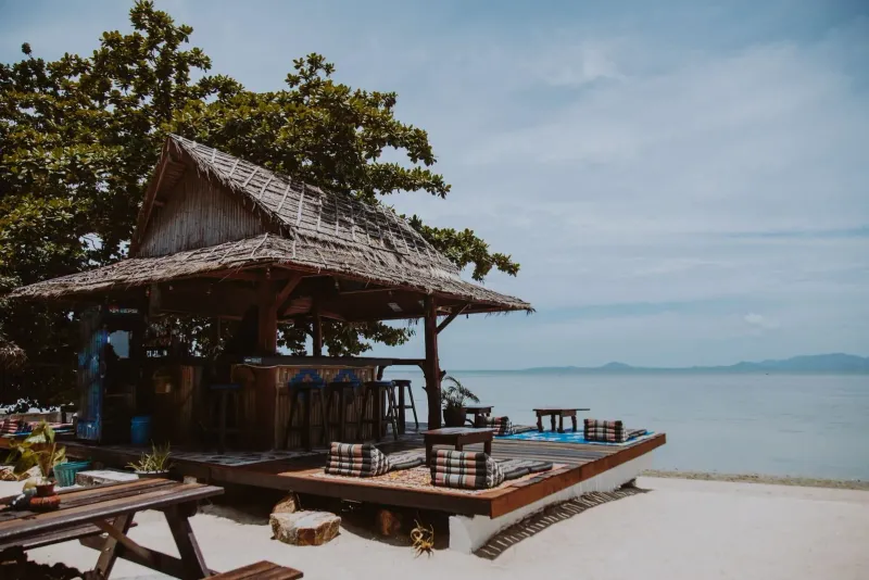 Rustic wooden beach hut with ocean views, typical of Koh Samui's laid-back beach bars