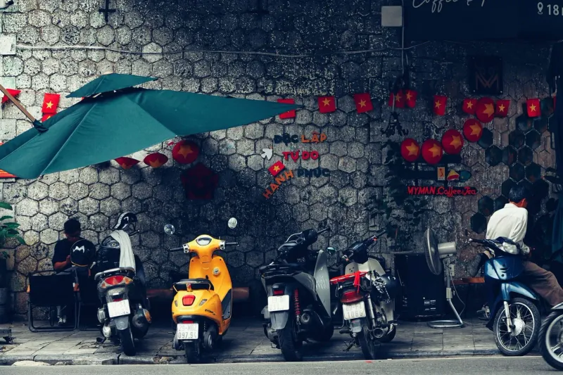 Scooters lined up outside a Koh Samui rental shop front