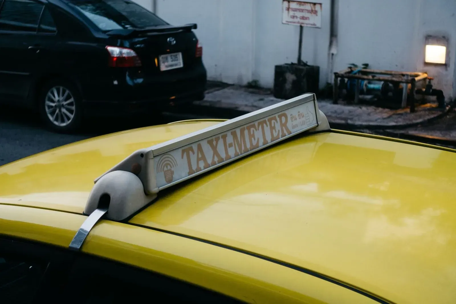 Close-up of a taxi meter sign, illustrating metered fare pricing used by Koh Samui taxis