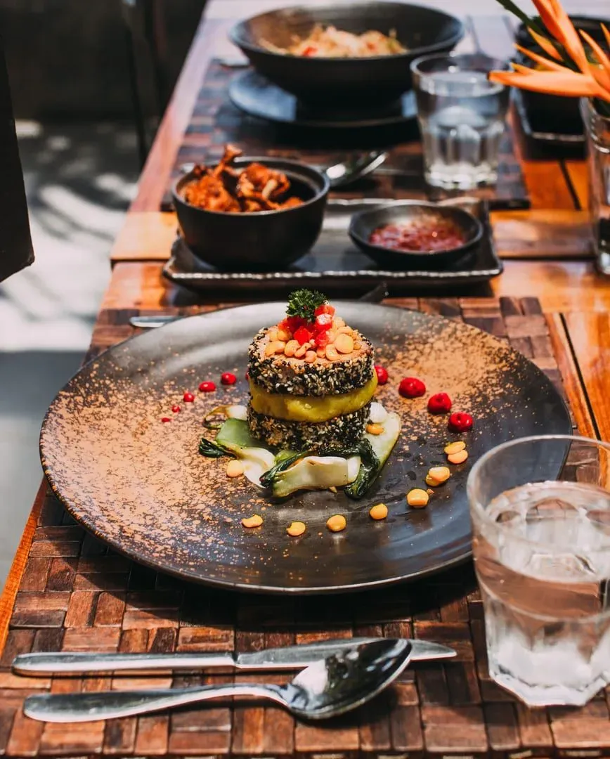 Gourmet vegetarian dish plated with artistic garnish at a Koh Samui restaurant