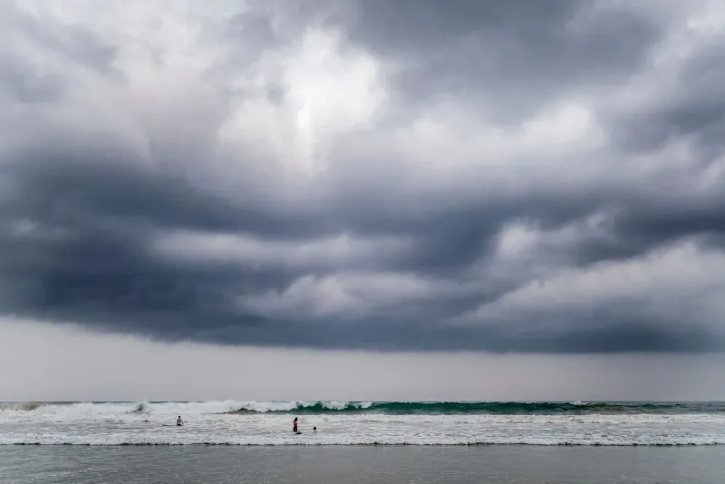 Dark monsoon storm clouds over choppy Gulf of Thailand waters near Koh Samui
