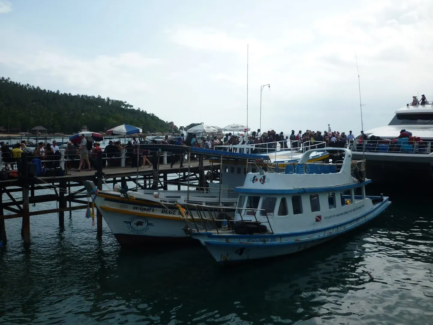 Wooden pier structure at Mae Haad on Koh Tao, where every ferry from Koh Phangan and Koh Samui docks