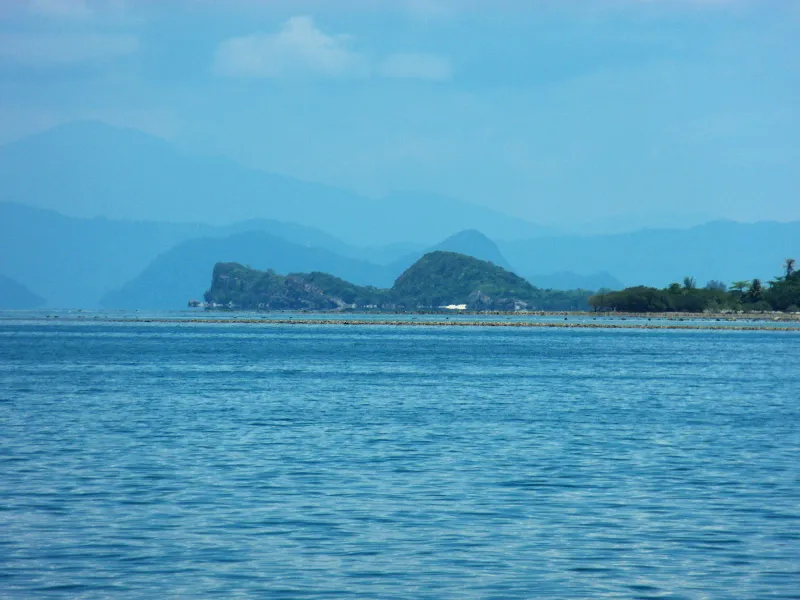 Calm sea and distant headland along the Hua Thanon and Maret coast near Krua Chao Baan restaurant, southeast Koh Samui