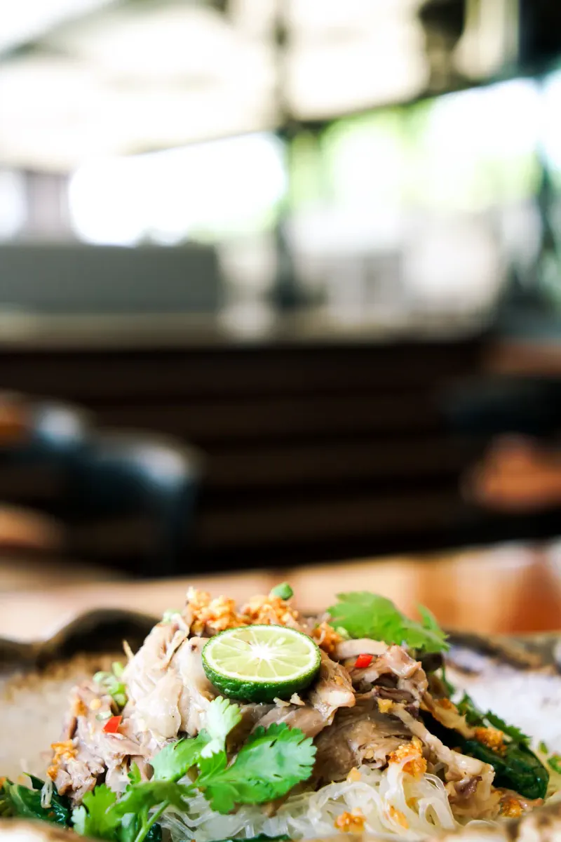 Thai lime chicken salad with rice noodles, a dish style served at Long Dtai restaurant, Koh Samui