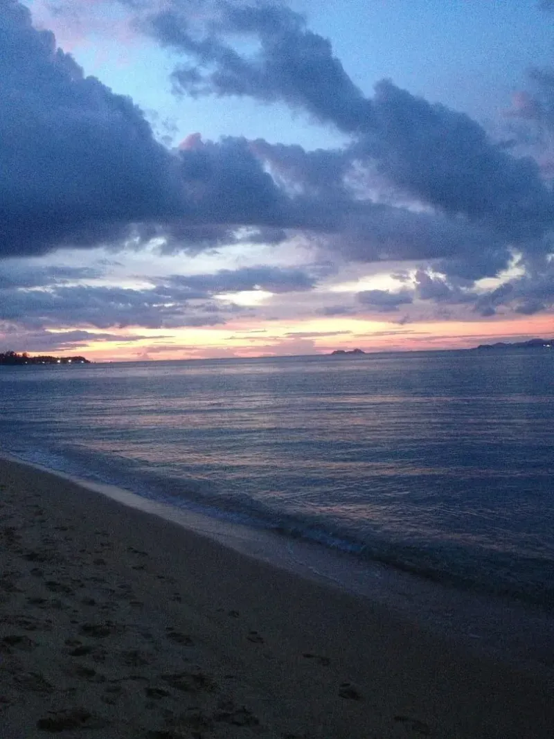 Dramatic sunset clouds over the strait, seen from Maenam Beach, Koh Samui