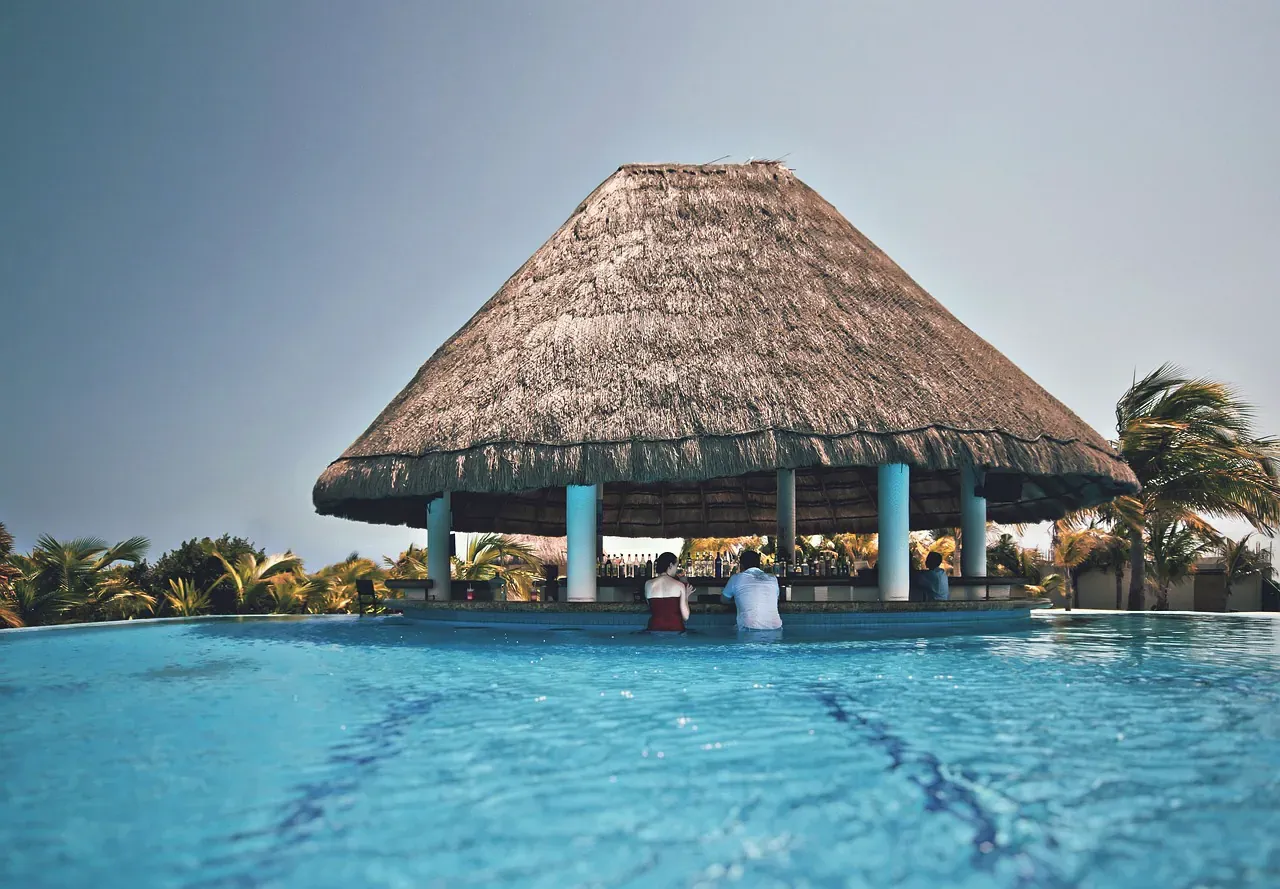 Poolside thatched bar at a tropical resort