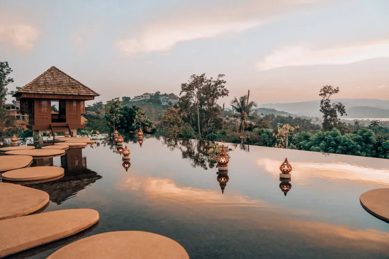 Ocean-facing pool and beach setting at The Ritz-Carlton, Koh Samui near Choeng Mon