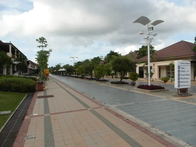 The clock tower plaza at Samui Airport's terminal grounds, near Bo Phut
