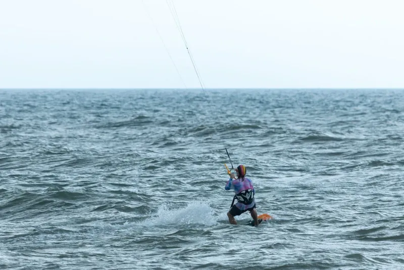 Kiteboarder riding a light-wind foil-friendly board off Koh Samui's south coast