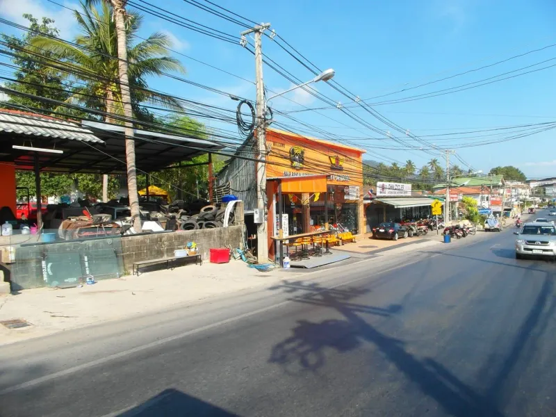 Coastal road scene near Chaweng Noi, Koh Samui, in the area around Superpro Samui