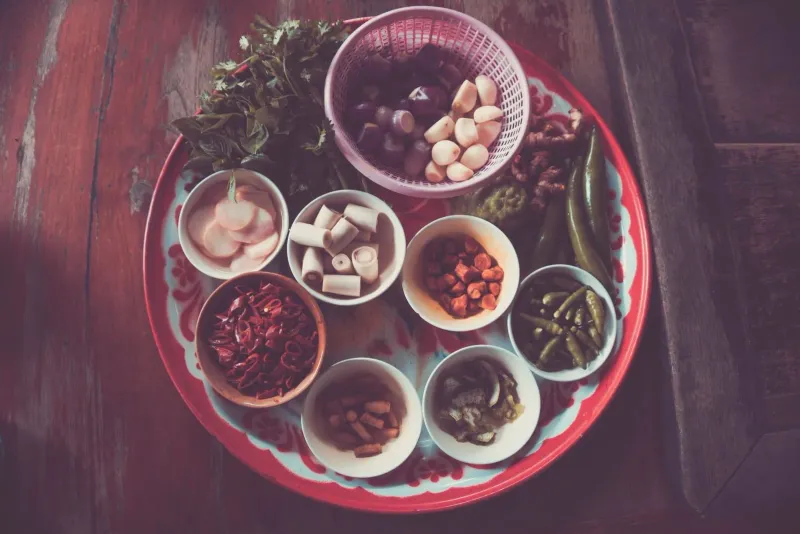 Fresh market ingredients laid out for a Thai cooking class on Koh Samui