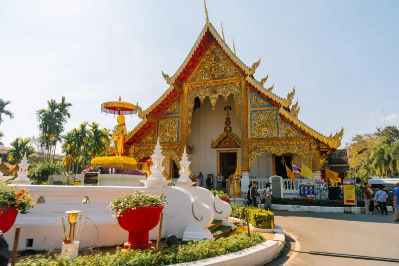 Golden temple facade with intricate details in Chiang Mai, a stop before the Koh Samui beach leg