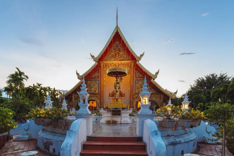 Wat Phra Singh temple in Chiang Mai at twilight during the itinerary's northern leg