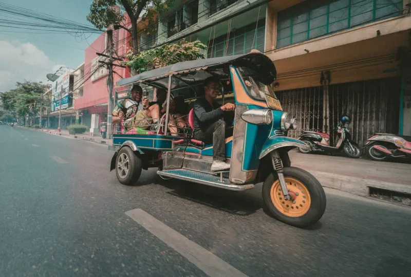 Colorful Thai tuk-tuk used for short trips and sometimes inflated tourist fares