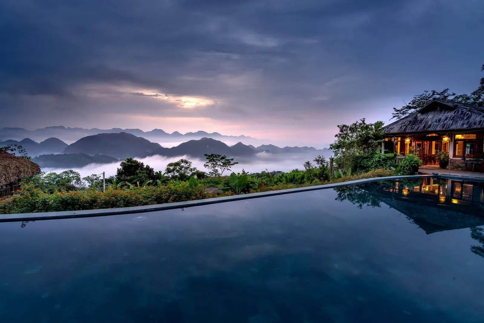 Twilight view from a hillside resort terrace overlooking the sea near Taling Ngam, Koh Samui