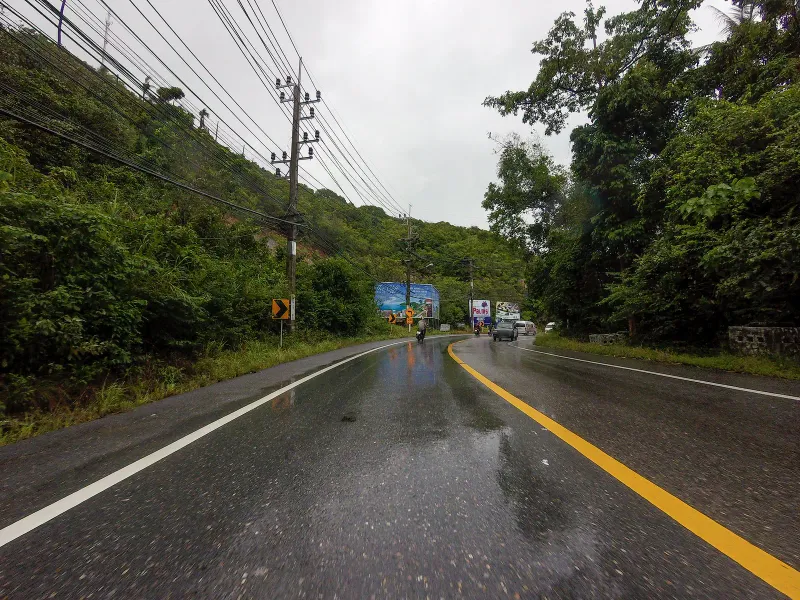 Roadside billboard advertising The Cliff restaurant on the headland road between Chaweng and Lamai, Koh Samui
