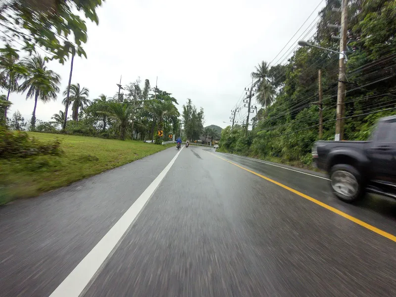 Wet-season view of the headland road near Silver Beach and The Cliff restaurant, Koh Samui