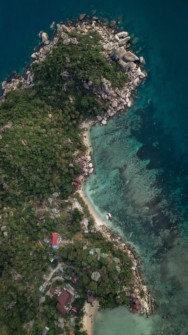 Aerial view of the lush green island coastline near Coral Cove Beach Koh Samui