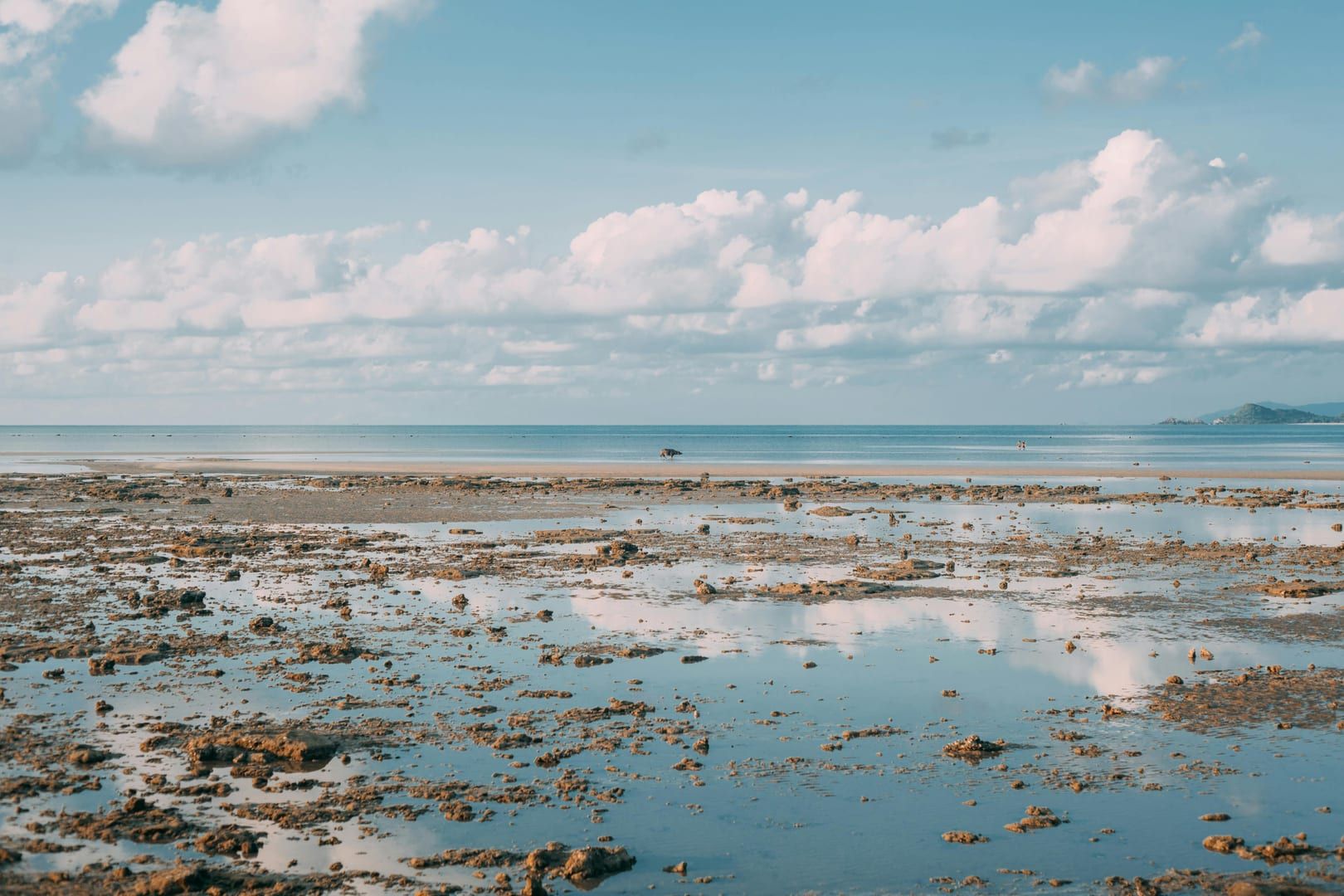 Low tide reflections at Lamai Beach southeast coast Samui