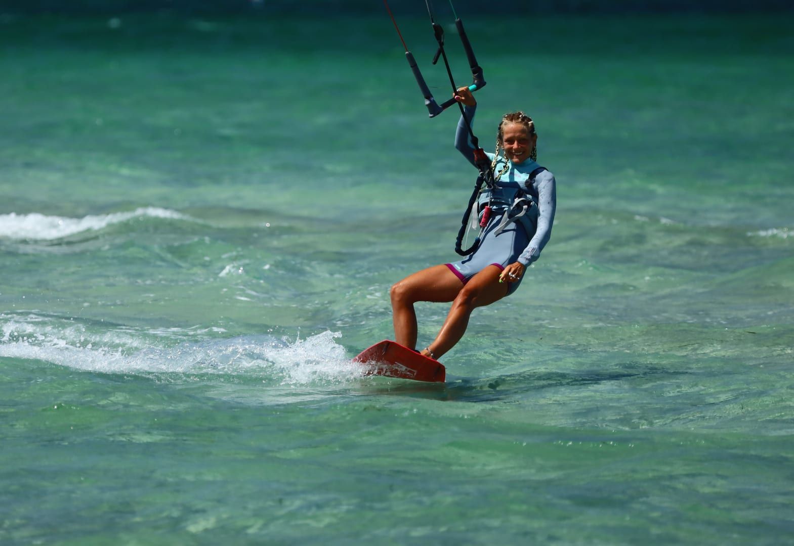 Kiteboarding session in the clear shallow waters of Koh Samui's south coast kite spot
