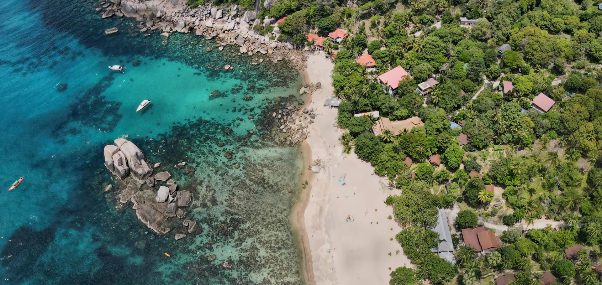 Aerial view of Silver Beach resort and turquoise waters on Koh Samui east coast
