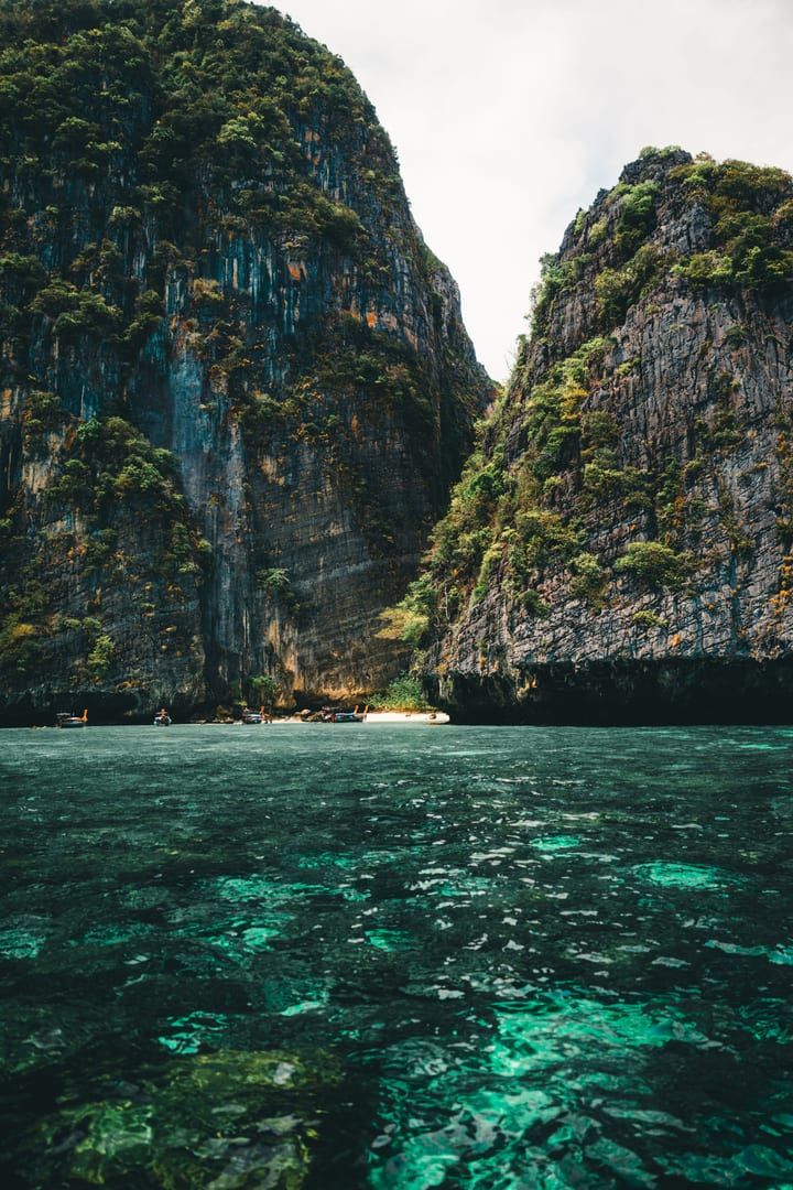Limestone cliffs and turquoise water on an Ang Thong Marine Park boat tour from Koh Samui