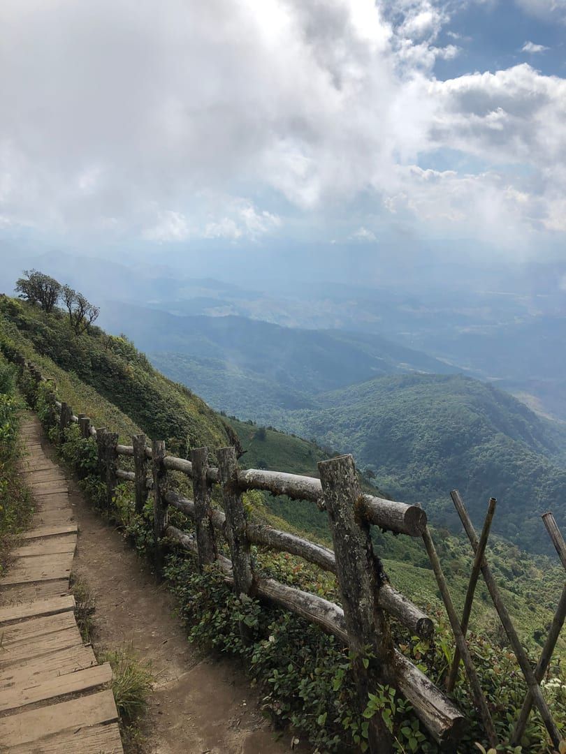 Mountain ridge trail with clouds on the Koh Samui panoramic viewpoint hike