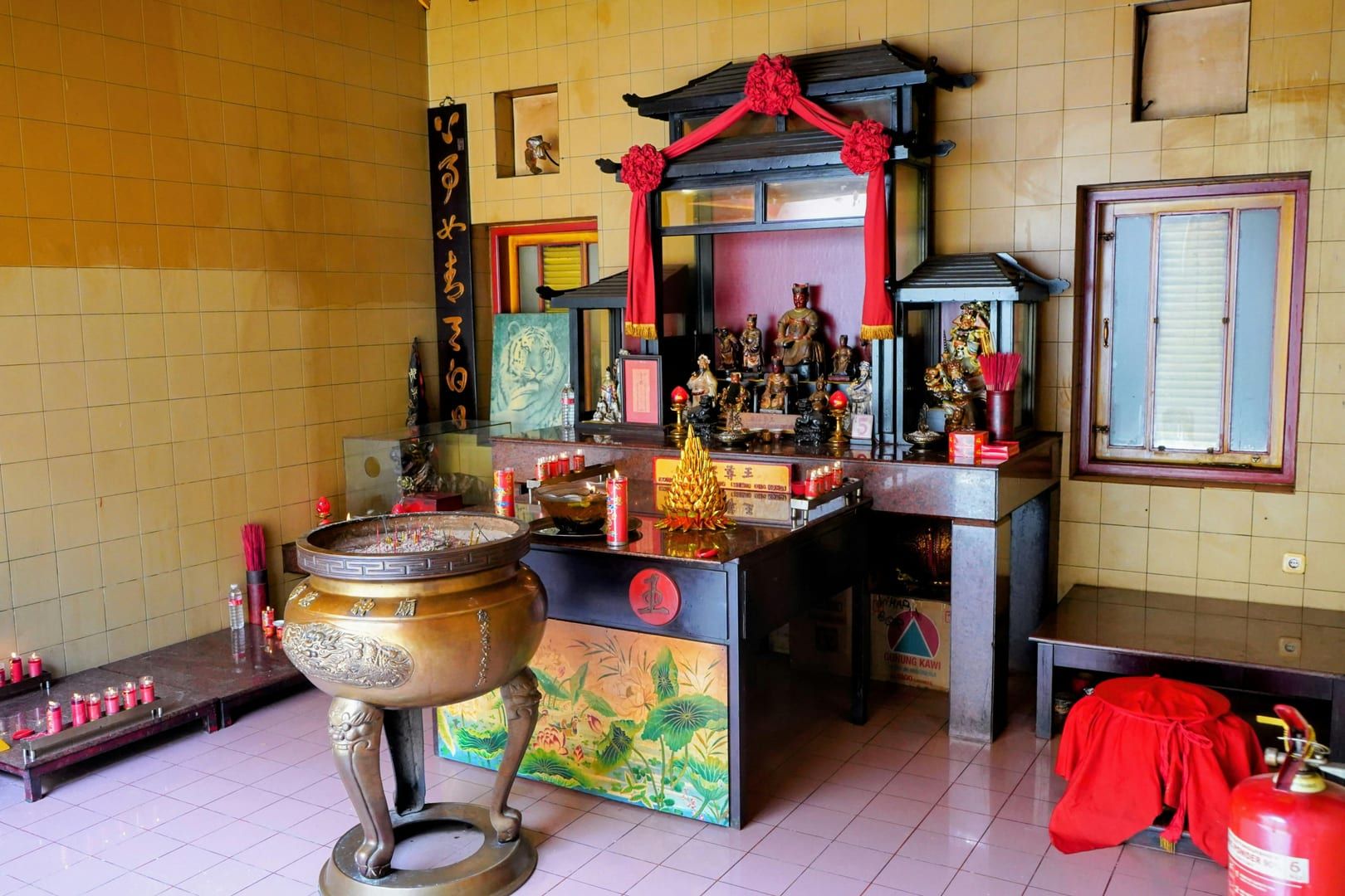 Interior of Nathon Hainan Shrine Samui with red lanterns