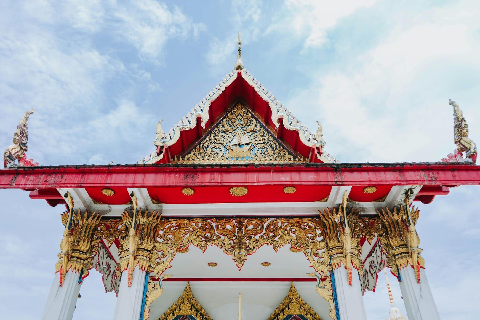 Peaceful gardens and shrines at Wat Laem Sor Koh Samui