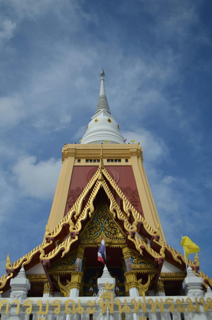 Peaceful tropical gardens surrounding Wat Na Phra Lan